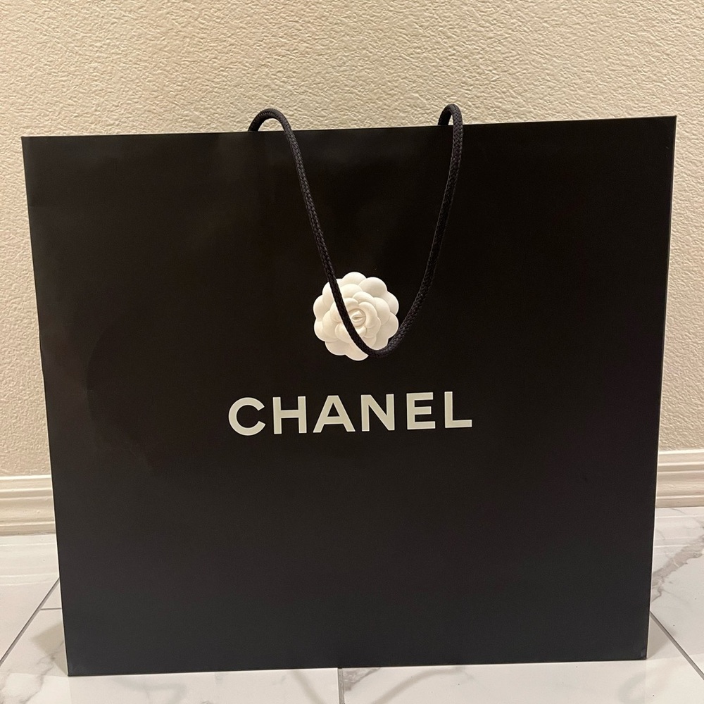 CHANEL Black Shopping Bag with White Camellia Accent